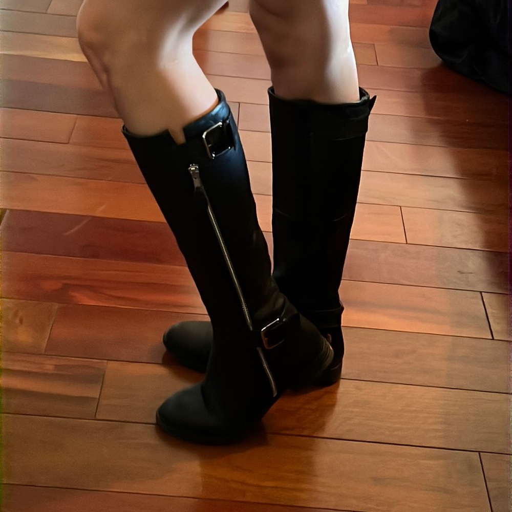 Steve Madden knee high black boots with silver zippers and buckles